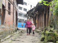 #2. After Church Service An Old Leady With Her Granddaughter In Yunnan
