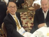 Gene Makes Friends With Andy Xie At The Future Of Asia Conference
